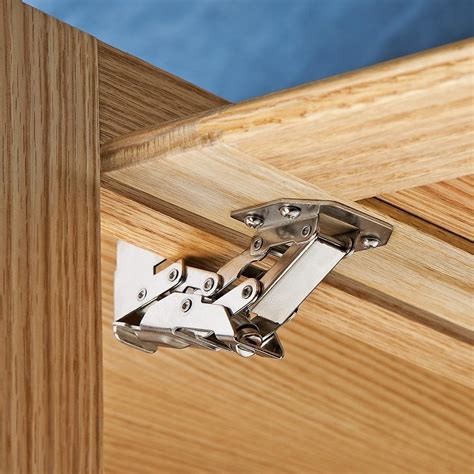 hinges for overhead cabinet doors